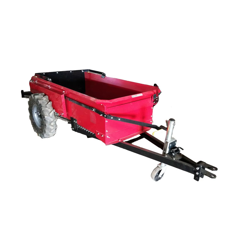 Penyebar pupuk traktor